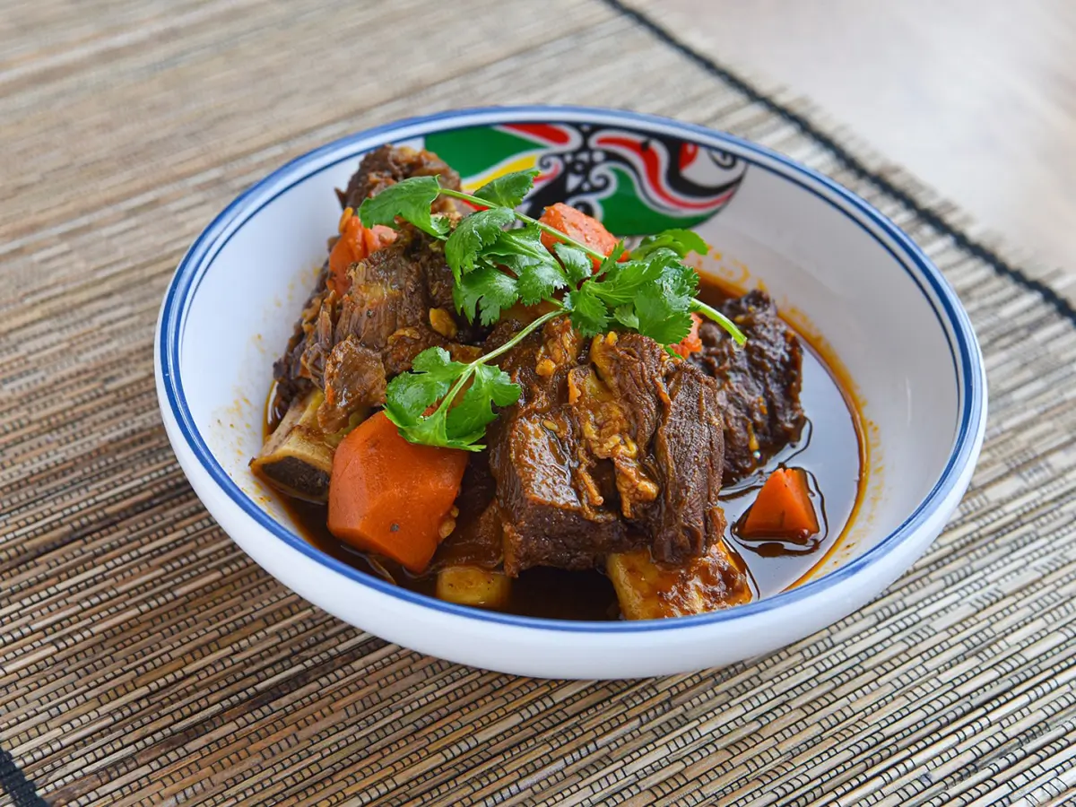 Braised Beef with Carrot of tender beef chunks and carrots cooked in a rich sauce at Dragon City, a Chinese restaurant in Albany